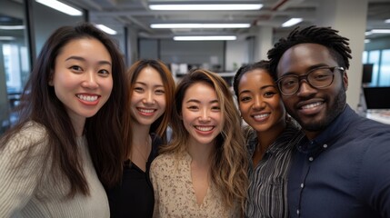 Fototapeta premium Collaborative Diversity Showcased in Office Setting: Five Individuals United by Smiles, Embracing Cultural Differences. Highlighting Cultural Diversity and Team collaboration concept. 
