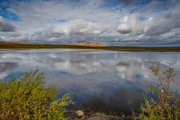 Obraz premium Reflections at Two Moose Lake in Tombstone Territorial Park in Yukon Territory, Canada