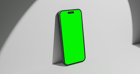 iPhone 16 Mockup with Green Screen on Minimalist Surface. 