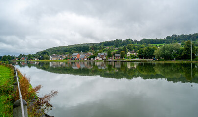 Scene with river Meuse and small village near Hastiere, Belgium
