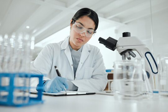 Laboratory, woman and scientist with clipboard for writing, treatment notes and planning for experiment. Healthcare, female expert or doctor with analysis for study test, checklist and medical report
