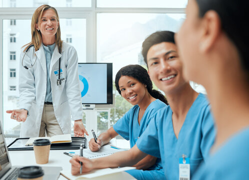 Computer screen, development or workshop and doctor in hospital boardroom with nurse students. Coaching, development and seminar with people in clinic for healthcare, consulting or medical internship