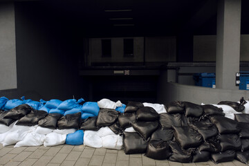 Wall of sandbags protecting underground parking in Poland