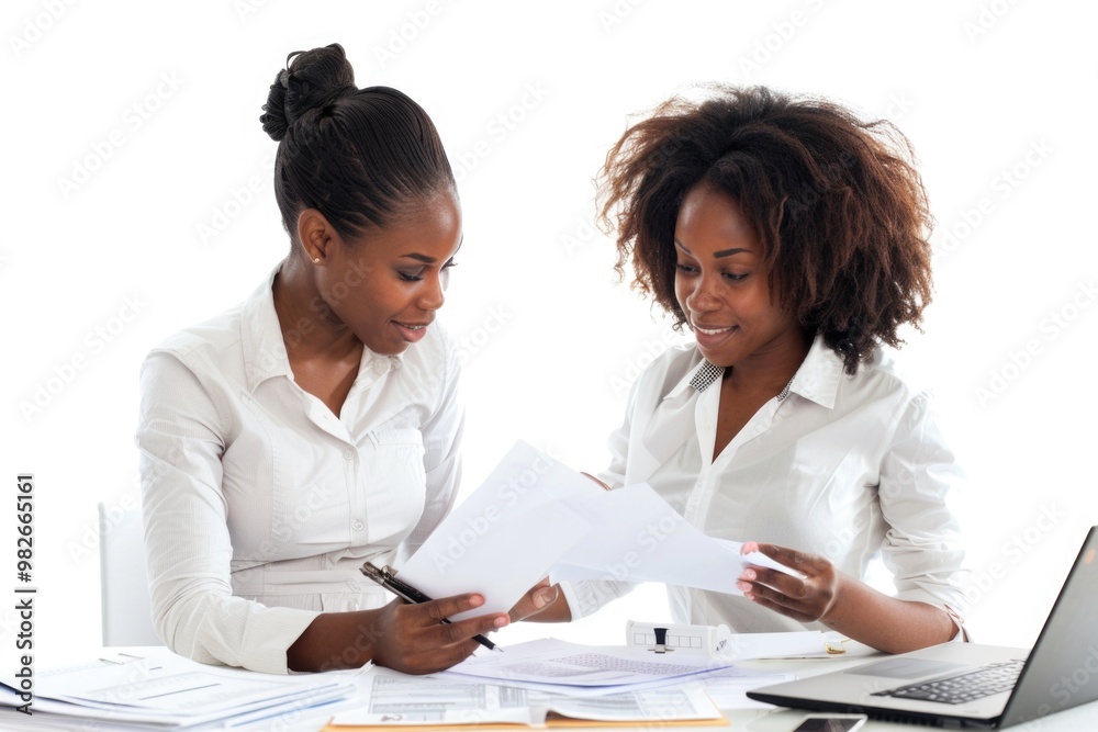 Poster two females reviewing papers and discussing something at a table