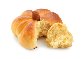 One tasty pumpkin shaped bun isolated on white