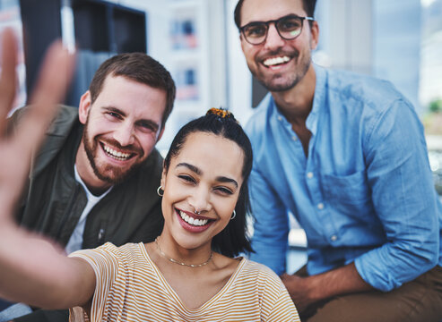 Portrait, people and smile with selfie at office with for social media post as graphic designers. Business, employees and happy or excited with support, memories and profile picture on collaboration
