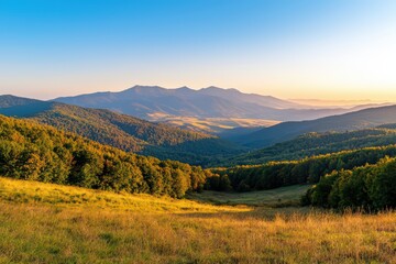 Breathtaking sunrise over a serene valley, surrounded by majestic mountains and lush greenery, perfect for nature lovers.