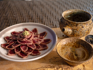 鹿のお肉で日本酒を飲む