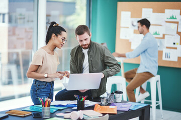 Creative, business people and team planning on laptop in meeting with data, stats or kpi. Group,...