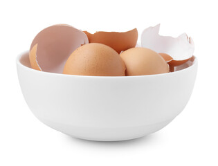 Broken eggshells in bowl isolated on white