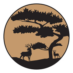 silhouette of a deer and a big tree
