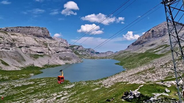  Swiss nature scenery. Gemmi pass (Gemmipass) cable car and Daubensee mountain lake. popular for hiking activities in Switzerland, Valais canton