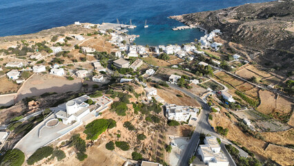 Aerial drone photo small port of Psathi untouched by tourism built below picturesque hora of Kimolos island, Cyclades, Greece