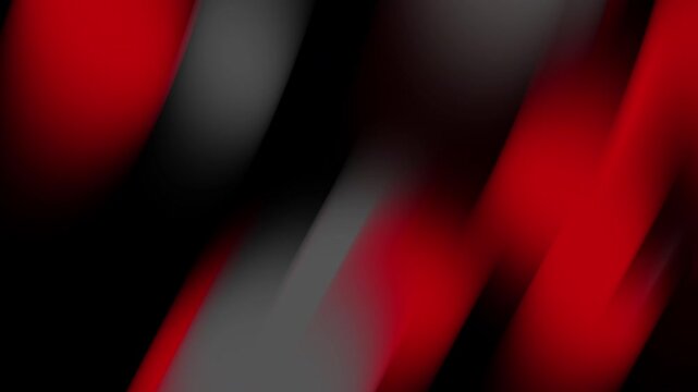 Diagonal dark red and grey gradient blurred stripes on black background suitable for graphic design projects, banners, backgrounds, and abstract concepts.