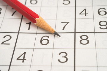 Sudoku puzzle game playing to challenge brain.