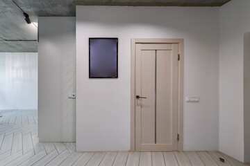 long empty corridor in interior of entrance hall of modern apartments, office or clinic