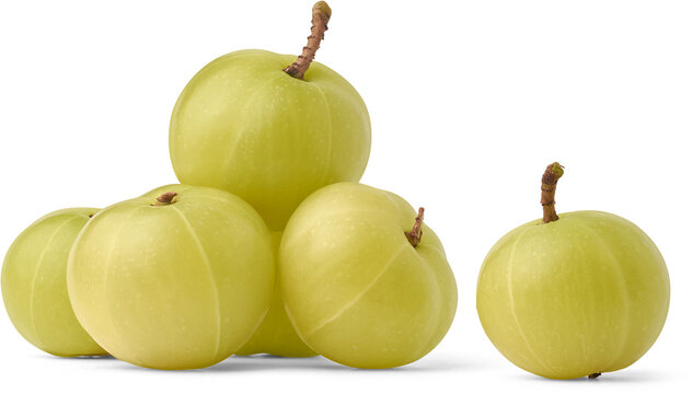 fresh amla or indian gooseberry isolated white background, small greenish yellow fruit with high vitamin c and health benefits in traditional ayurveda medicine