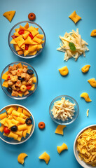 Bowls with different tasty uncooked pasta on blue background isolated with white highlights, png