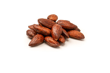 A group of caramelized almonds isolated on a white background.