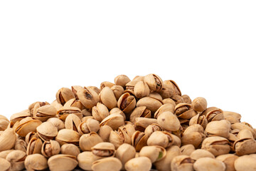 Tasty pistachios isolated on a white background.