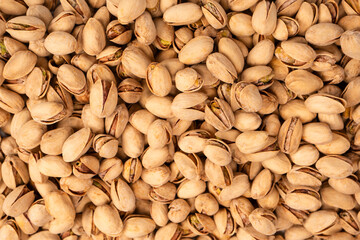 Tasty pistachios isolated on a white background.