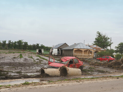 Houses and cars destroyed by floods caused by Storm Boris in Galati, Cudalbi, Romania