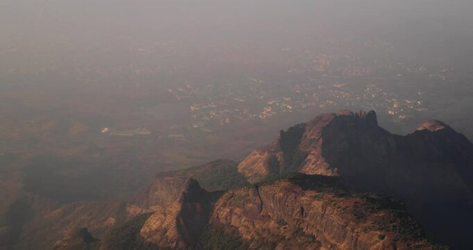 Mumbai, India. Badlapur, Savaroli, Maharashtra. Aerial View From plane Window On View of the Mumbai suburb district. Evening morning sunset sunrise light. residential district skyline cityscape