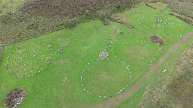 Aerial view of a group of women worshipping at the Beaghmore Stone circles at Blackrock Road by Cookstown in County Tyrone, Northern Ireland