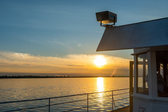 evening sunset on the Severnaya Divna river view from the deck of a pleasure steamer