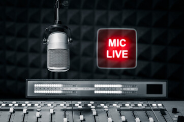 Professional microphone and sound mixer in radio station studio