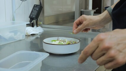 Restaurant kitchen. Pasta with seafood and sauce. Ready meals, pasta with shrimp and squid. close-up