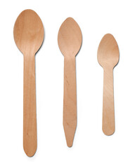 different sizes of disposable wooden spoons isolated white background, eco-friendly alternative single use cutlery used in parties, picnics, takeaway meals