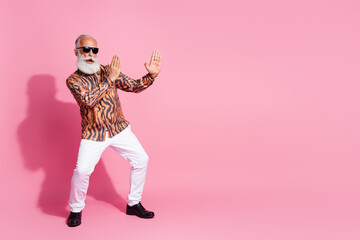 Photo of crazy funky old man defending copyspace enemy doing fight wear shiny shirt isolated pastel color background