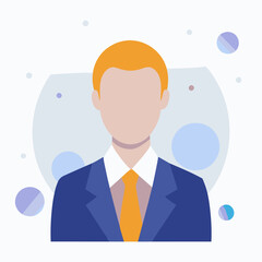 A man in a suit and tie with a tie that is orange. The man is wearing a blue suit and has a beard