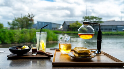 Japanese tea ceremony in the tearoom, aroma cherry blossom. Sakura Asia teahouse with traditional desert. Finest Japanese tea experience