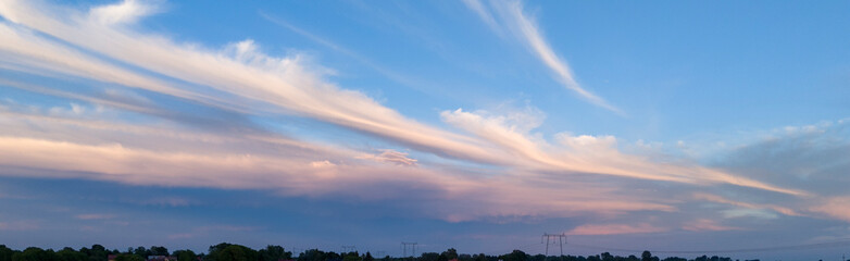 A beautiful sunset with colorful clouds creating a stunning sky view, perfect for nature lovers and landscape photography enthusiasts.
