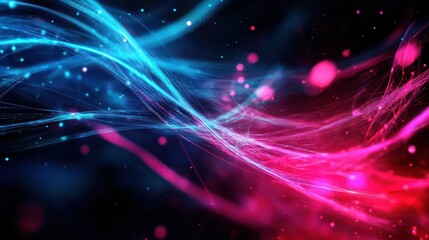 Fototapeta premium Abstract light trails in blue and pink with a magical glow against a dark background.