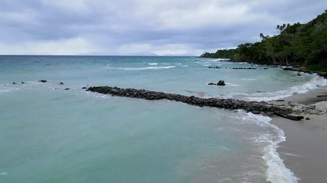 Rock Breakwater Withstands Powerful Ocean Waves