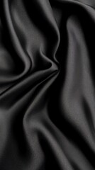 Obraz premium Close-up of luxurious black fabric with soft, smooth texture, ideal for fashion, upholstery, and design projects.