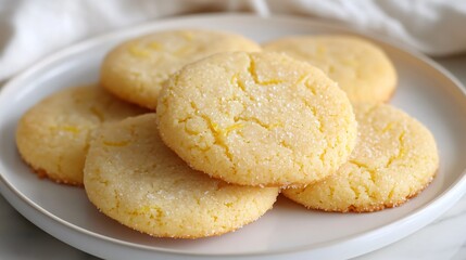Lemon zest cookies, placed neatly on a clean white plate