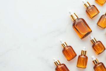 Aerial shot of a group of glass serum bottles arranged in a spiral pattern on a marble surface, serum bottles, elegant product display concept