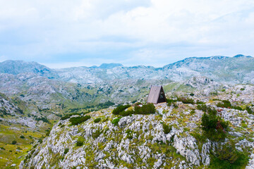 Beautiful a-frame mountain house shelter in the wilderness on the mountain