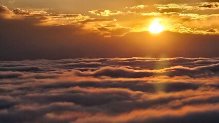 Obraz premium sunset over the clouds