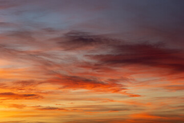 The sky glows with colors at sunset, creating a peaceful and awe-inspiring scene. Perfect for any design project, this celestial display is captivating and serene