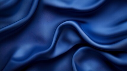 Fototapeta premium A tight shot of blue fabric showcasing a wavy pattern at its upper edge and lower hem