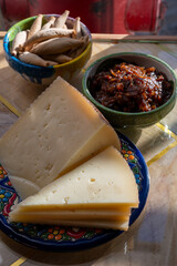 Cheese collection, Spanish matured cheese and onion chutney close up