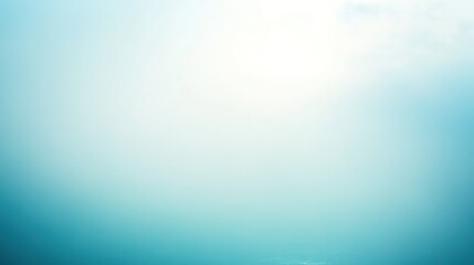 Bright sky above tranquil ocean waters at midday with soft waves lapping the shoreline