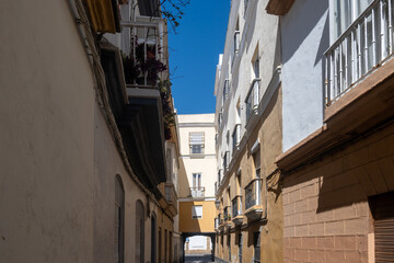 Fototapeta premium Walking through Cadiz, one of oldest cities and ports in Europe on Atlantic Ocean in southern Spain in Andalusia, tourists destination