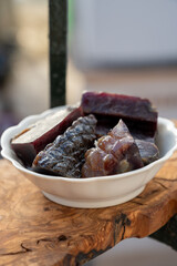Pieces of very matured cured ham jamon serrrano iberico