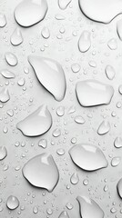   A close-up of water droplets on a surface with drops at the bottom of each droplet